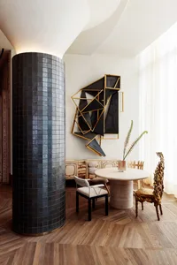 Modern residential space featuring tile, wood, and metal materials.