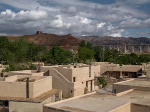 A rendering of residential buildings constructed from clay materials.