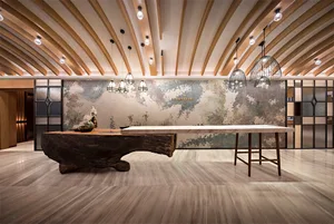 Industrial-style café interior featuring marble tables and wooden elements