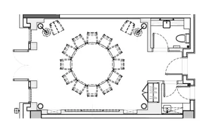 A detailed floor plan of a conference room showing furniture arrangement and functional zones.