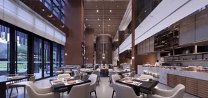 Modern industrial restaurant interior with sleek, minimalist design.
