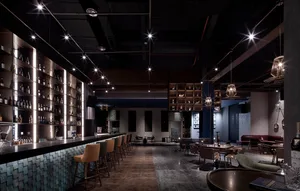 A modern bar featuring metallic elements and sleek design.