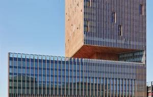 A modern building with a steel exterior and glass.