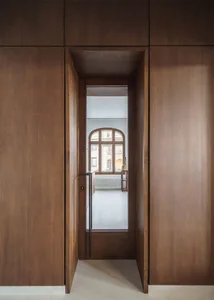 Modern entryway with wooden walls and flooring