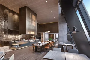 Modern restaurant interior featuring metallic finishes, glass countertops, and wooden furnishings.