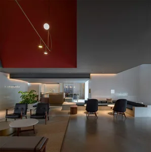 Modern living room with minimalist furniture and concrete materials