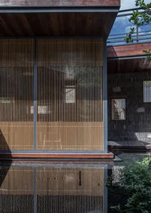 This image showcases a modern interior design featuring wooden elements and glass windows.