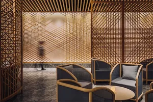 Modern restaurant with wooden decor and furniture.