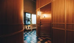 Interior design featuring wooden paneling and minimalist decor