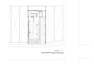 A detailed technical architectural drawing of a modern interior space, featuring various functional zones and layout.
