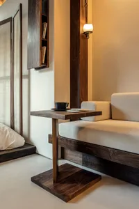 A modern interior living room with wooden furniture and a cozy atmosphere.