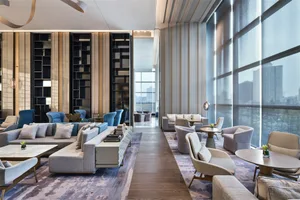 Modern luxury conference room with concrete, matte black, and white furniture.