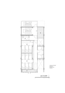 Floor plan of a residential structure with labeled rooms and hallways.