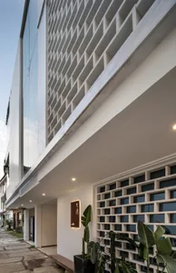 Modern exterior building with glass and concrete materials
