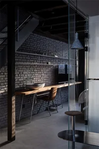 An industrial-style living space featuring a metal tube frame and various functional zones.