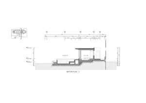 Section plan of a living room featuring concrete flooring and a swimming pool adjacent to the living space.
