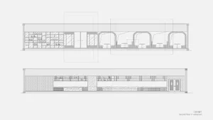 Sectional view of a modern restaurant interior showcasing the counter and bar area with concrete finishes and sleek, industri
