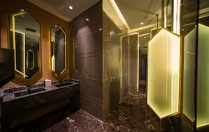 A modern bathroom featuring marble elements and a sleek, contemporary design.