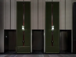 Modern lobby interior with metal, glass, and wooden elements
