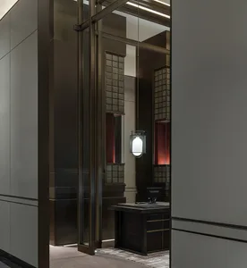 Modern lobby with glass and metal elements.