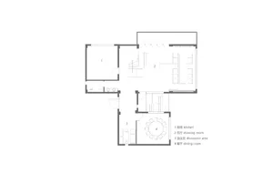Floor plan of a modern residential space with kitchen, drawing room, discussion area, and dining room.