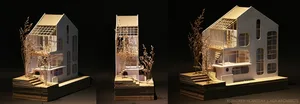 Three views of a modern architectural model made of cardboard.