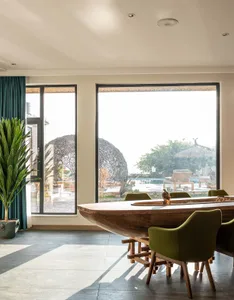 Modern living room interior with a wooden table.