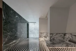 Modern interior spa area with marble walls and floor tiles