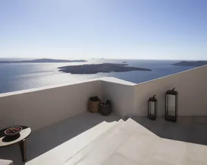 Modern minimalistic patio with concrete floor overlooking the sea and islands.