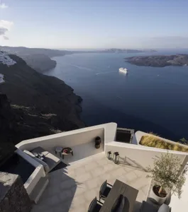 Vacation resort with concrete and glass terrace overlooking the sea