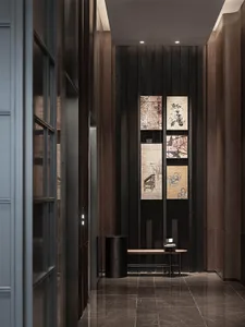 Modern interior design featuring dark wooden panels and contemporary art in a hallway.