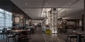 Modern restaurant interior with concrete and glass materials.