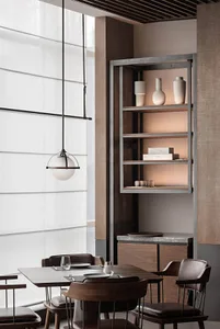 A modern restaurant interior featuring wooden furniture, metal accents, and glass elements.
