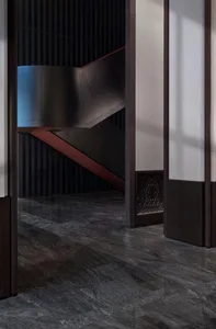 Modern staircase featuring marble and metal elements.