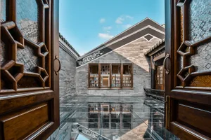 A traditional library with glass and wood elements.