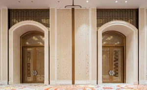 Architectural view of a minimalist interior featuring a wooden and glass door with intricate geometric patterns.