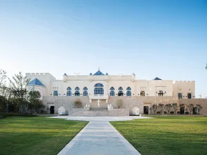 A modern building with stone architecture features.