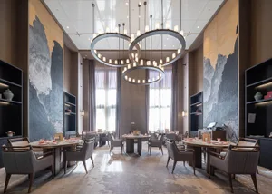 Modern, luxurious dining room with contemporary wood, metal, and textured floor.