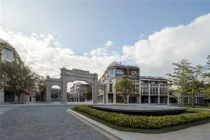 A modern commercial space with concrete and glass materials.