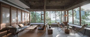 A modern living room featuring concrete walls and floor, with large windows overlooking a scenic outdoor view.