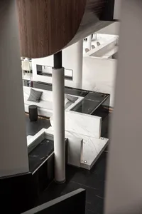Modern living room with marble flooring and platform