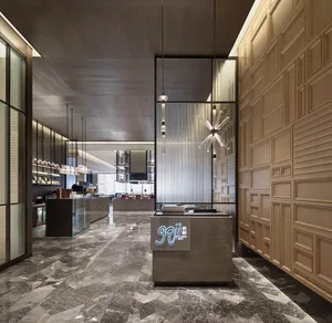 Modern restaurant interior with marble flooring and wood panel walls