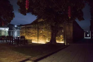 Concrete structures of an ancient village at night