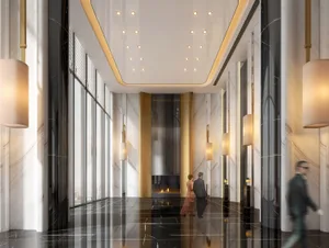 A modern hotel lobby with marble walls, glass columns, and a central fireplace.