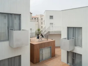 Modern architectural building exterior with concrete materials and contemporary design.