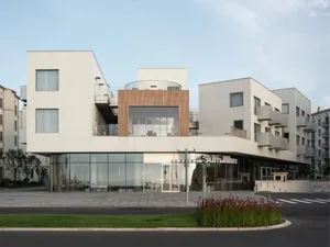 Modern building constructed with concrete, featuring minimalist design elements.