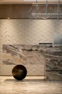 A modern lobby featuring marble elements.
