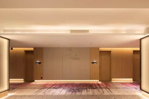 A modern office space featuring glass walls.