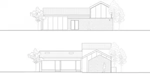 A modern exterior design featuring a metal roof with a gable structure.
