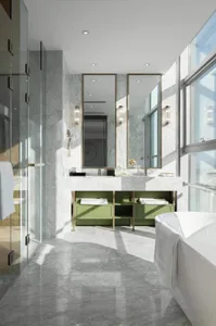 A modern minimalist bathroom featuring marble walls and a green cabinet with a white bathtub and sink.